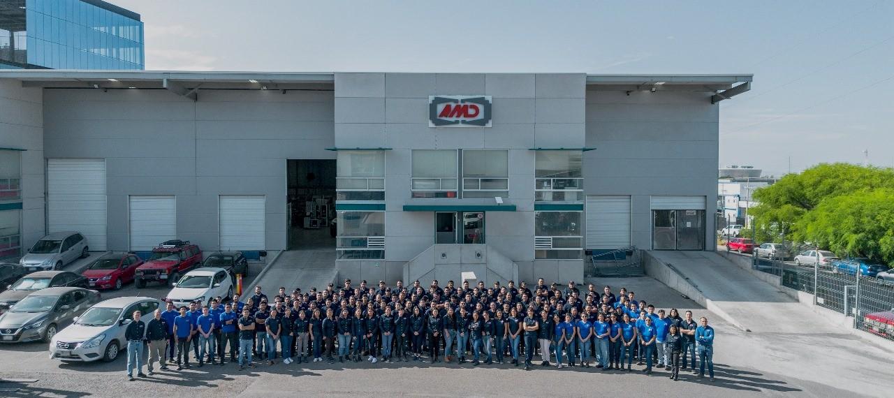 AMD Machines team and expanded facilities with new branding