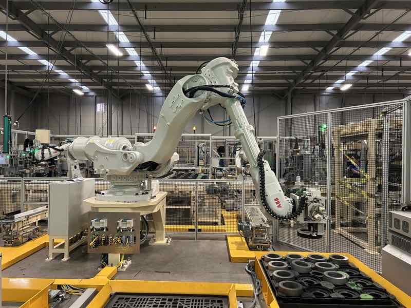 AMD Automation manufacturing facility with ABB industrial robot and parts handling system